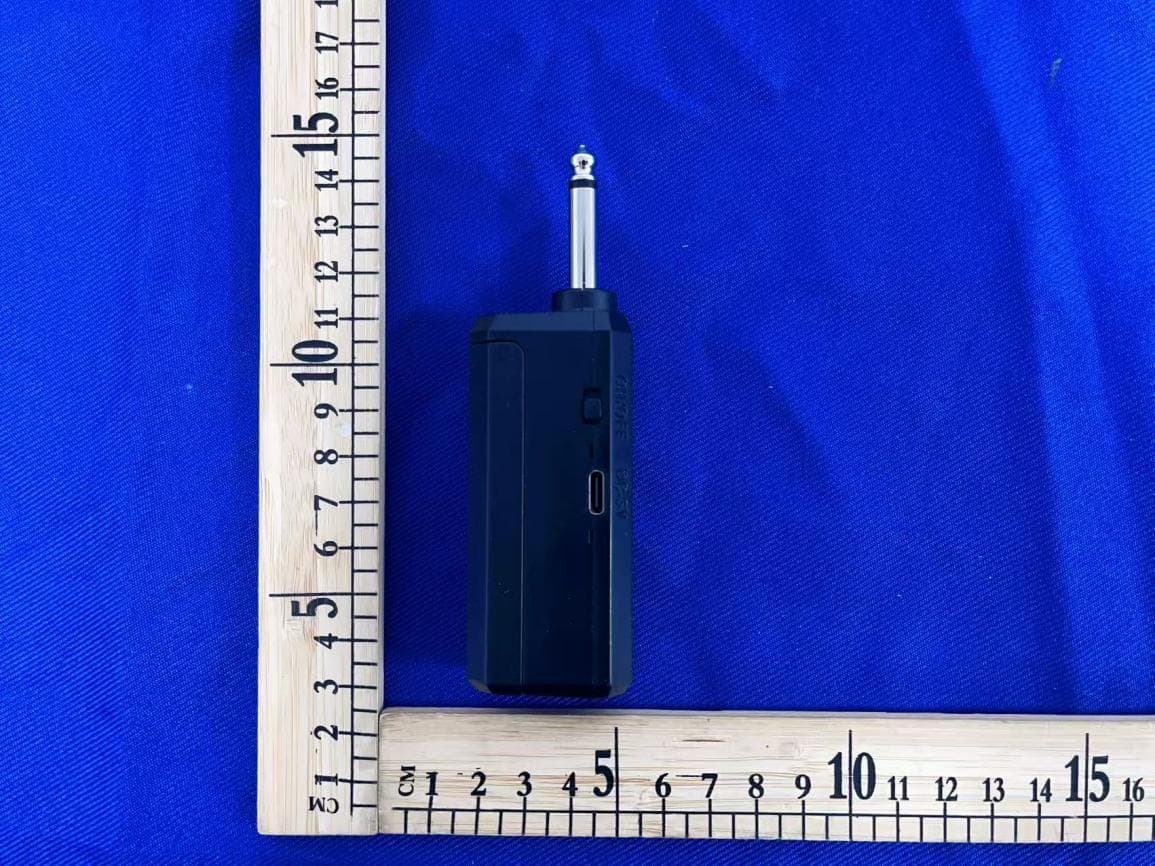 Wireless microphone - FCC ID 2BXKN-SP5RX - Qingyuan Soundpeak Electronics Co., Ltd