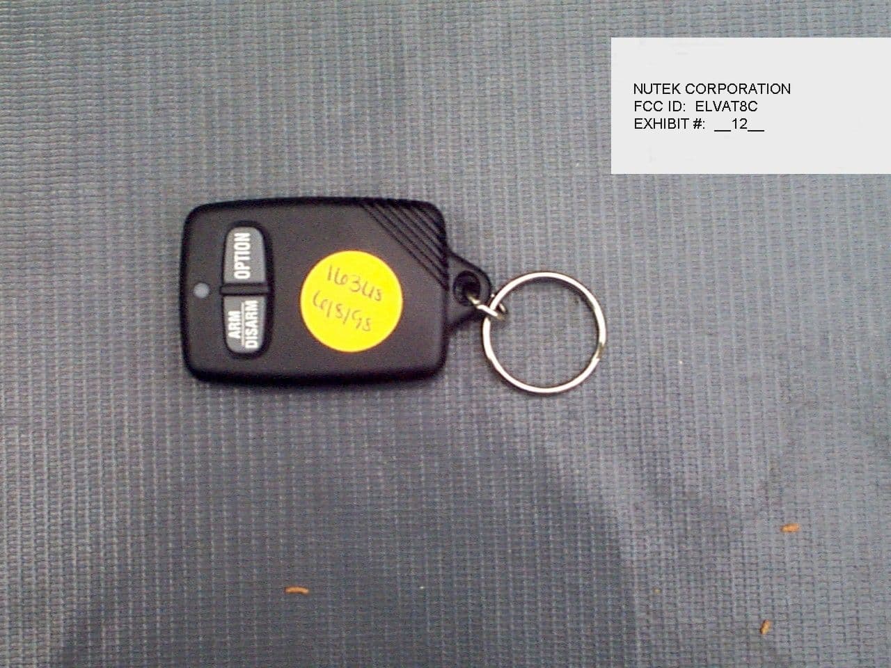 Security Device TX - FCC ID ELVAT8C - Nutek Corporation