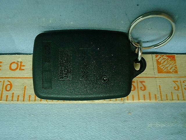 Car Alarm Transmitter - FCC ID ELVATOF - Nutek Corporation