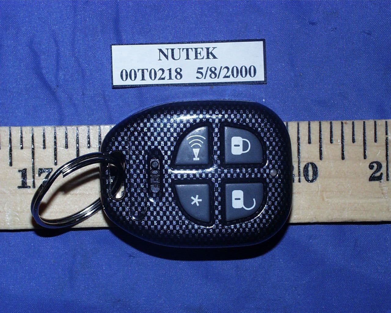 434 MHz Car Alarm Transmitter - FCC ID ELVMT0B - Nutek Corporation