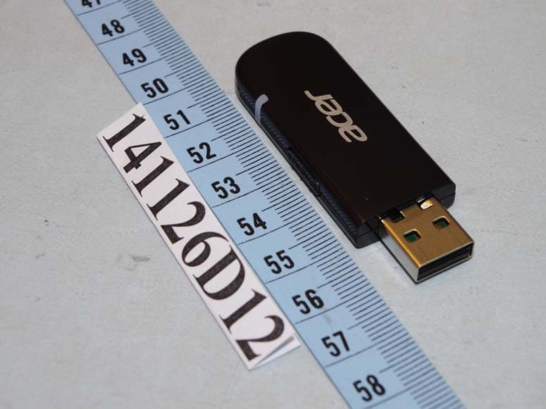 Dongle - FCC ID EMJDDGRF14D - Primax Electronics Ltd
