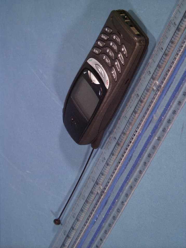 Tri-Mode Dual-Band Analog/PCS Phone - FCC ID GMLNHP-2AX - Microsoft Corporation
