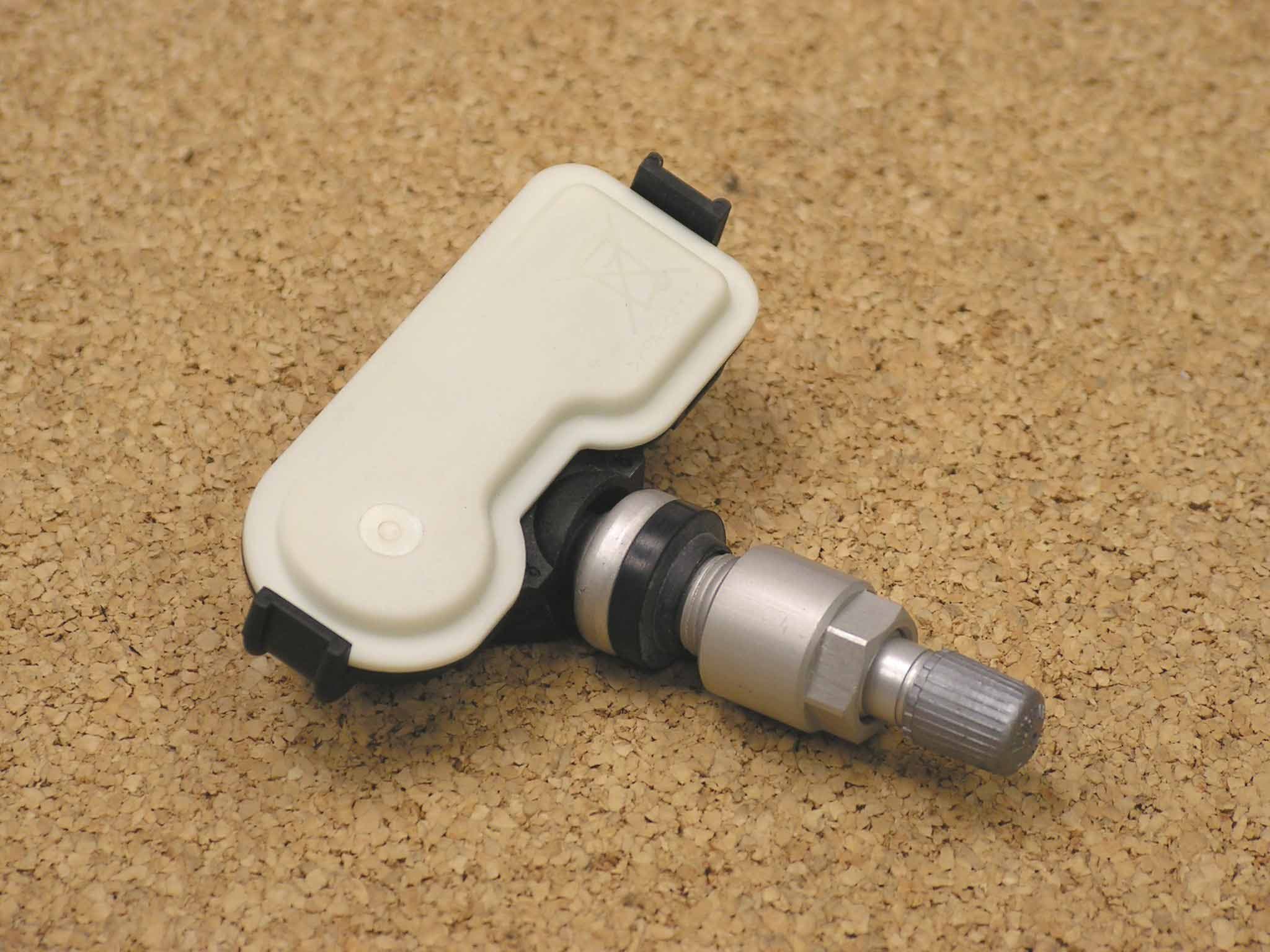 Tire Pressure Monitor Transmitter - FCC ID GQ4-46T - BCS Access Systems US LLC