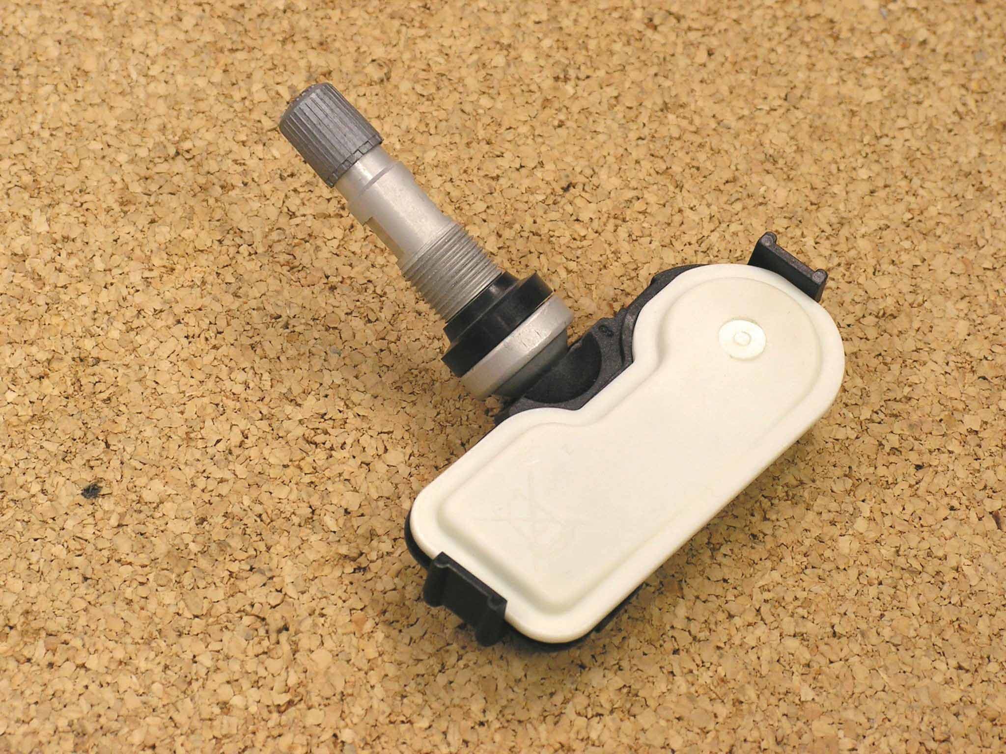 Tire Pressure Monitoring Transmitter - FCC ID GQ4-60T - BCS Access Systems US LLC