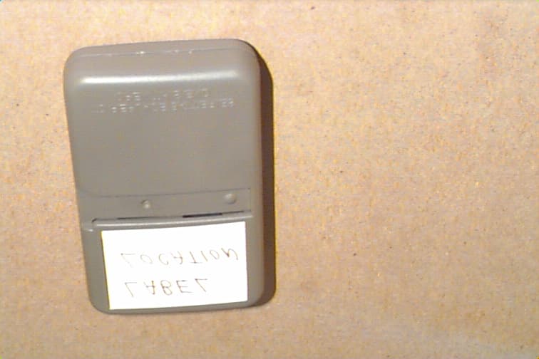 Remote control transmitter - FCC ID HBW1255433 - Chamberlain Group LLC, The