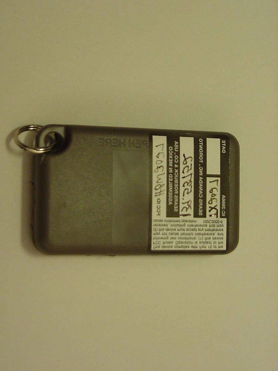 Remote Control Transmitter - FCC ID HBW2027 - Chamberlain Group LLC, The