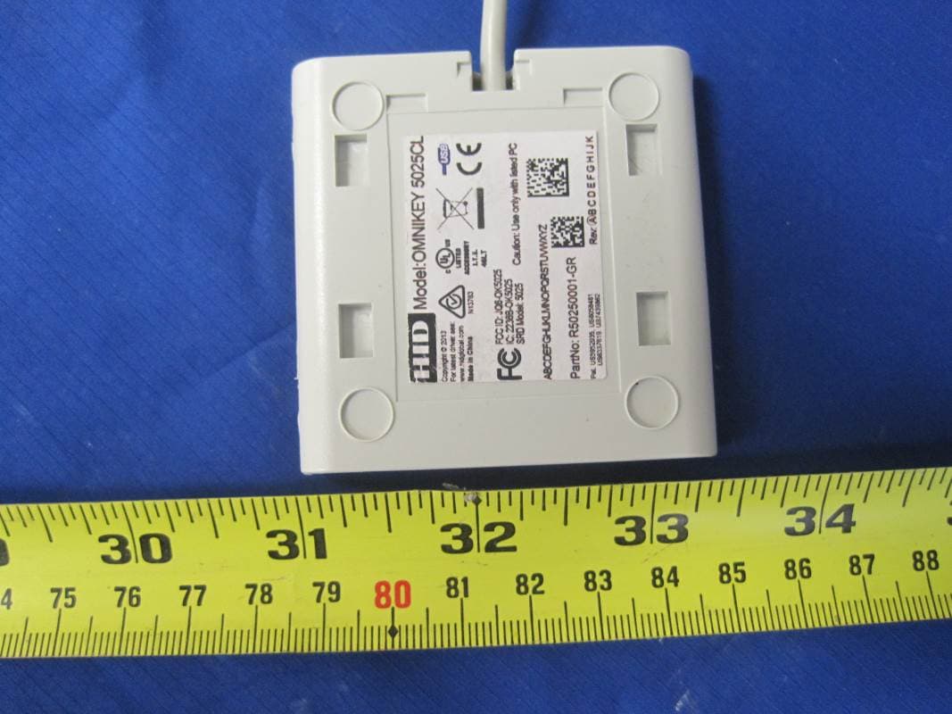 Contactless Reader With USB CCID-Compliant Interface for Desktop Use - FCC ID JQ6-OK5025CL - HID Global Corporation
