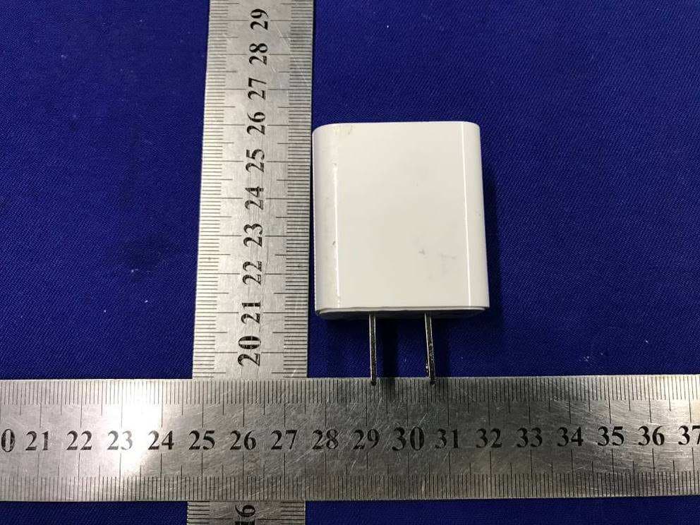 BOOST CHARGE Magnetic Wireless Charger Stand - FCC ID K7SWIB003 - Belkin International, Inc.