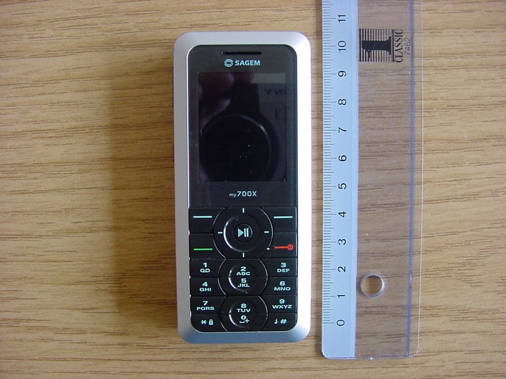 GSM/EDGE 900/1800/1900 Mobile Phone with Bluetooth - FCC ID M9HME2006 - Sagem Wireless