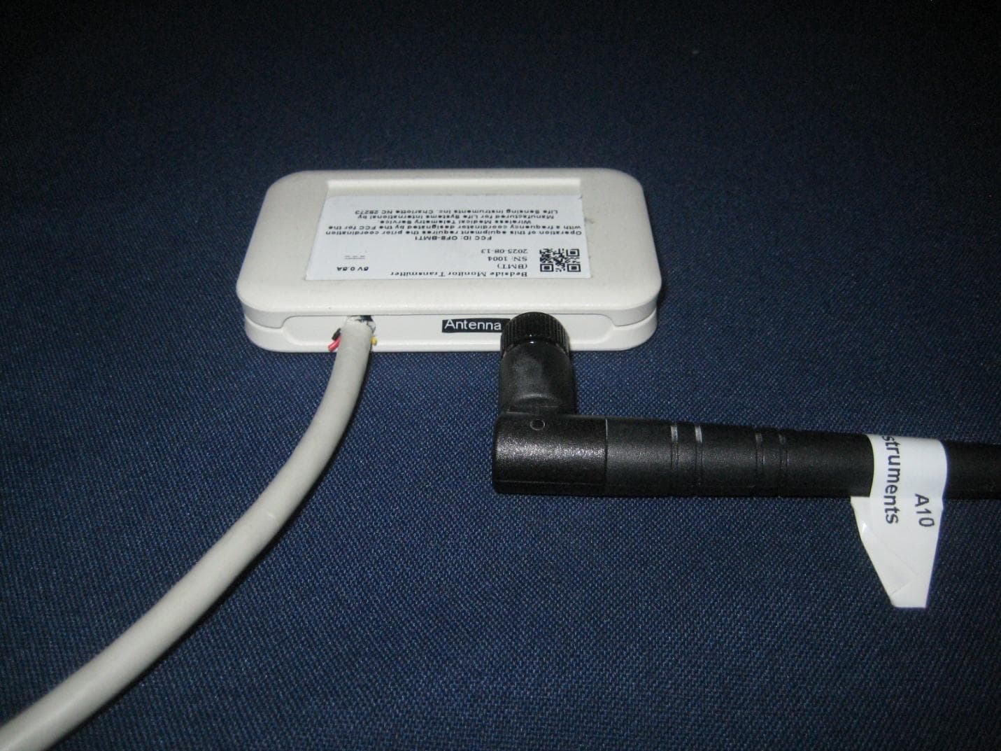 Bedside Wireless Transmitter - FCC ID OF8-BMT1 - Life Sensing Instruments, Inc.