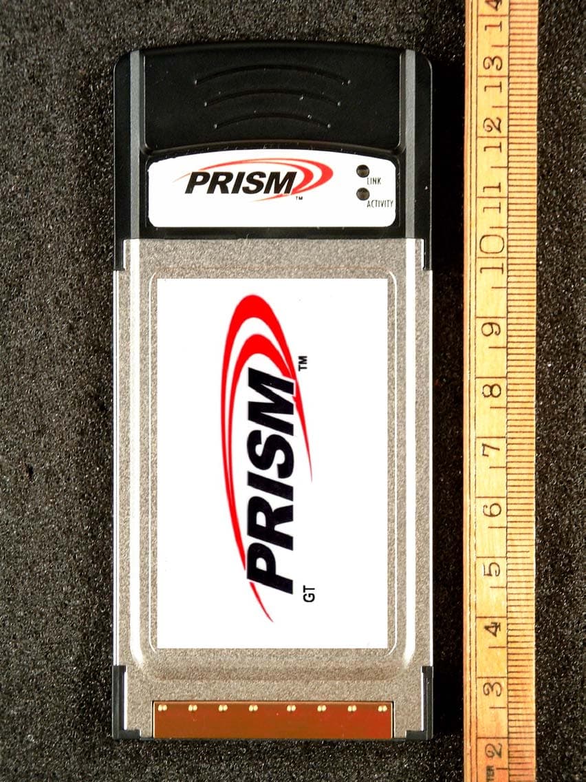 2.4 GHz IEEE 802.11g WLAN Cardbus Card - FCC ID OSZ38000C - Conexant Systems Inc.