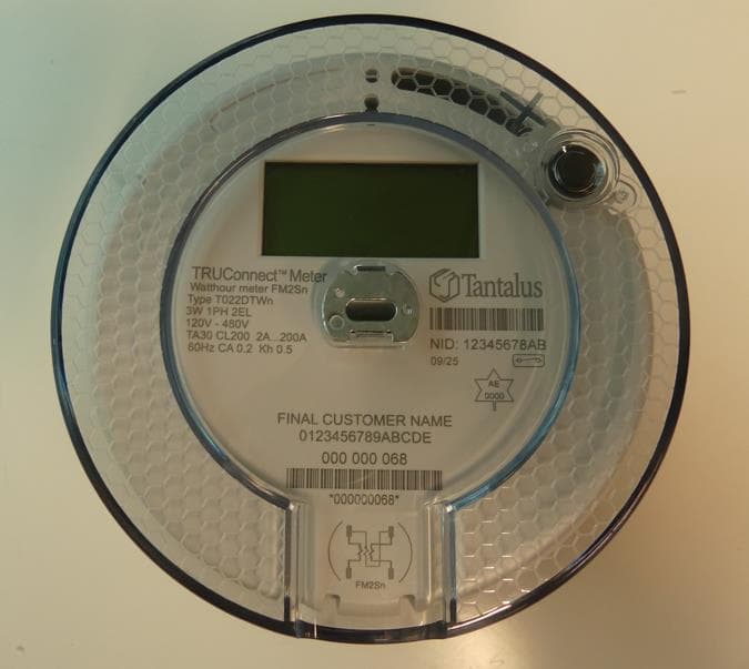 Residential power meter with integrated communication module - FCC ID OZFSTIM - Tantalus Systems Corp