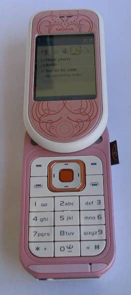 GSM 900/1800/1900 Cellular Telephone W/BT - FCC ID PPIRM-209 - Microsoft Corporation