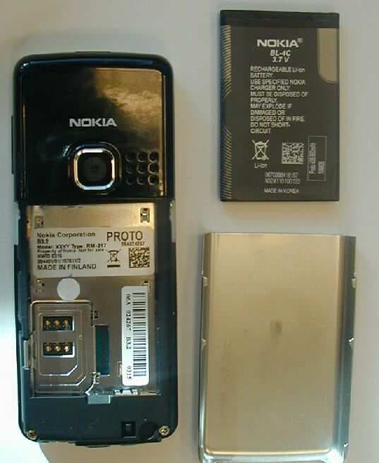 GSM 900/1800/1900 Cellular Telephone W/BT - FCC ID PPIRM-217 - Microsoft Corporation