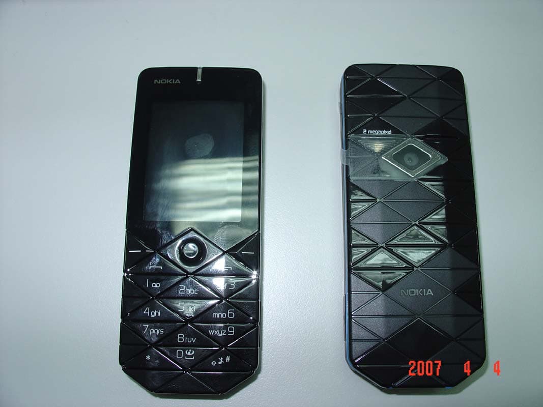 GSM 850/ 1800/ 1900 Cellphone with Bluetooth - FCC ID PPIRM-250 - Microsoft Corporation