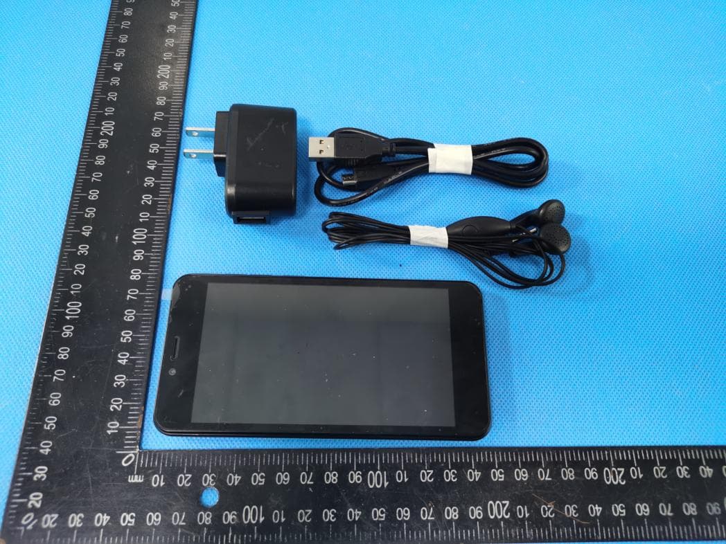 Mobile Phone - FCC ID QRP-SP-026 - Azumi S.A
