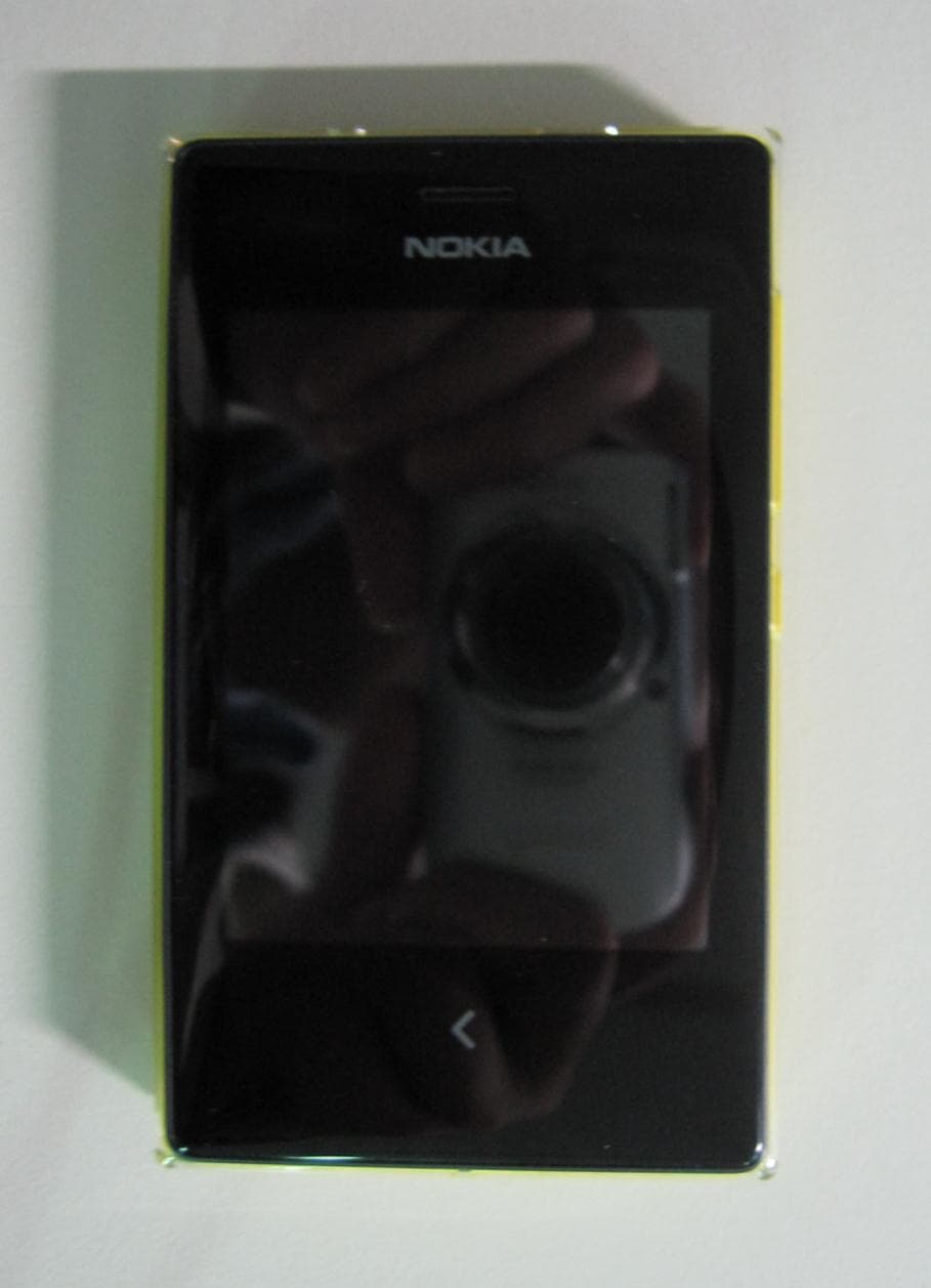 GSM-WCDMA cellular phone w/BT and WLAN - FCC ID QTLRM-959 - Microsoft Corporation