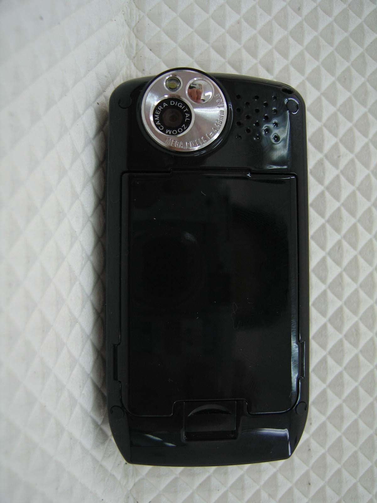 Tri-Band GSM Mobile Phone with BT - FCC ID RV2SL900 - Ezze Mobile Tech., Inc.