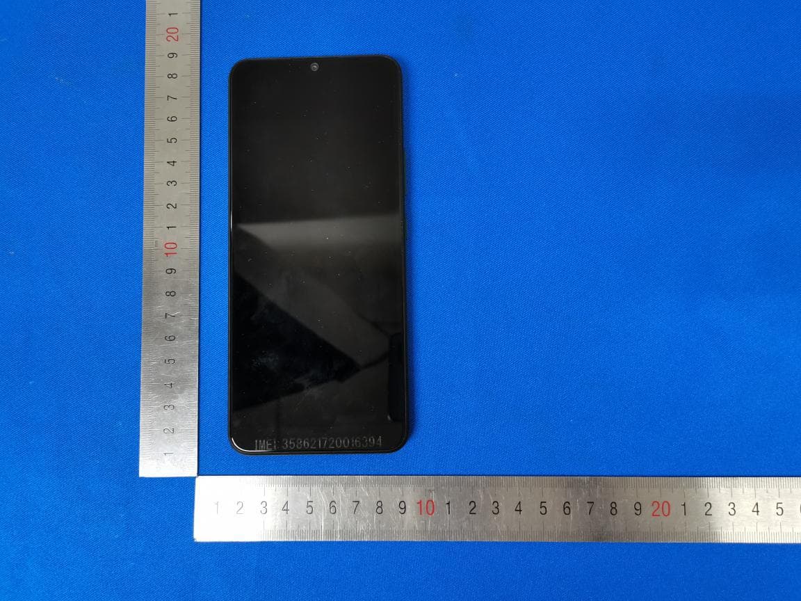 WCDMA/LTE Mobile Phone - FCC ID RYQEC1002 - FIH CO., LTD.