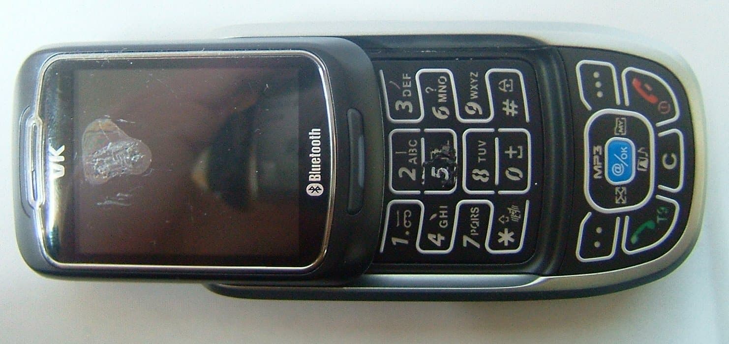 QUAD-BAND GSM PHONE WITH BLUETOOTH EQUIPMENT - FCC ID SBWVK4500 - VK Corporation