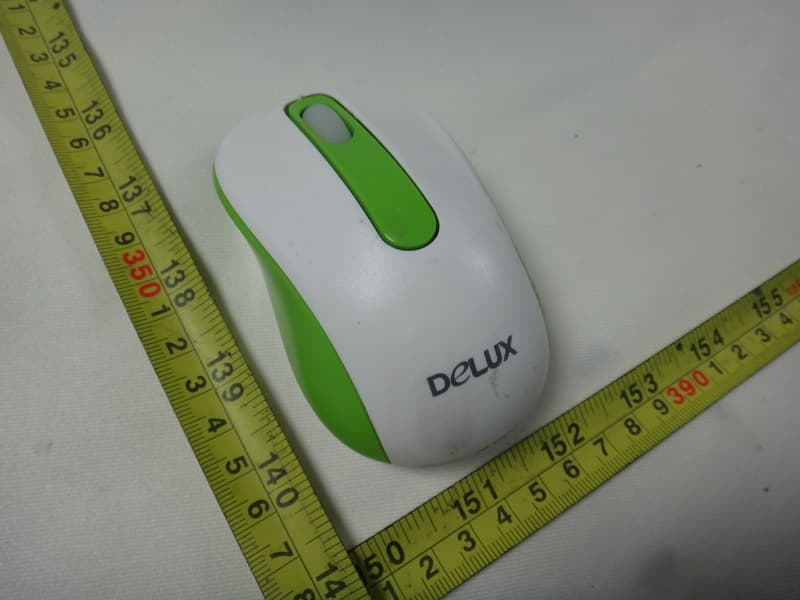 Wireless Mouse - FCC ID SGPM10203 - Shenzhen Delux Industry Co., Ltd.