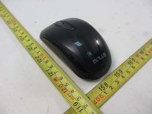 Wireless Mouse - FCC ID SGPM10703 - Shenzhen Delux Industry Co., Ltd.