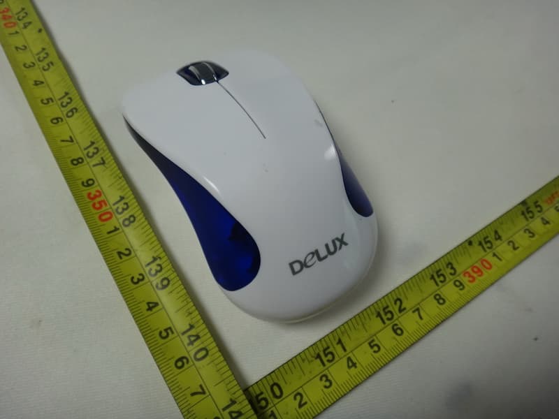 Wireless Mouse - FCC ID SGPM37703 - Shenzhen Delux Industry Co., Ltd.