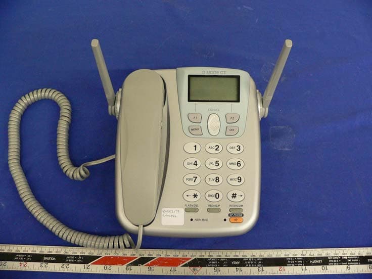 Dual Mode CDMA 850/1900 MHz & 2.4GHz FHSS Phone - FCC ID SNBDM1000C - Waxess Inc.