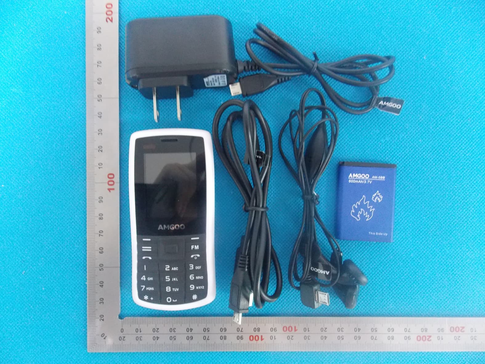 Mobile Phone - FCC ID UOSAM83Z - Amgoo Telecom Co., Ltd.