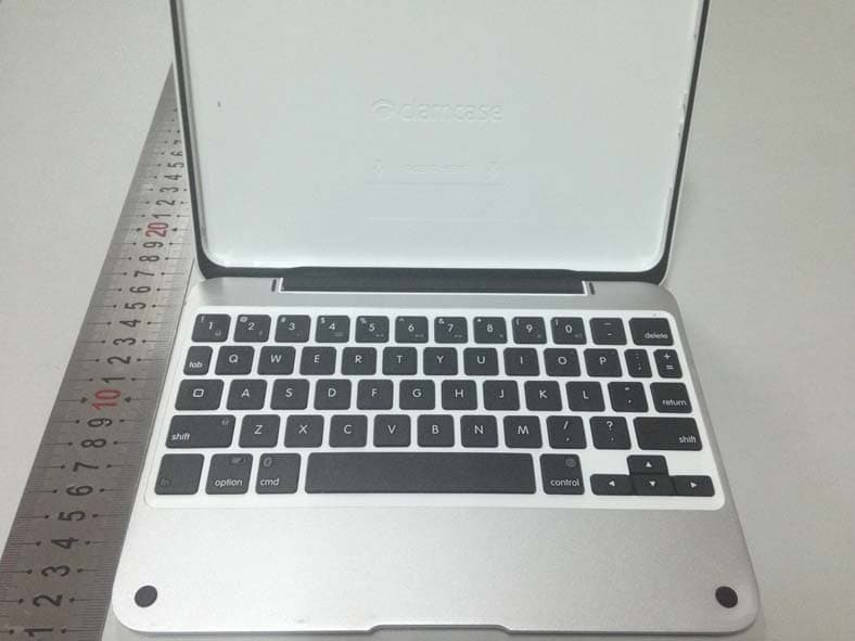 IPAD ACCESSORY WITH KB AND BT RADIO - FCC ID YUG-CM1001 - CLAMCASE, LLC