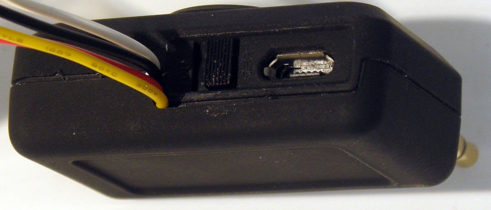 Wireless audio transmitter 3.5mm dongle - FCC ID Z6J-SMS001D - SMS Audio